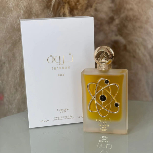Tharwah Gold de Lattafa Perfumes inpiração Libre Intense